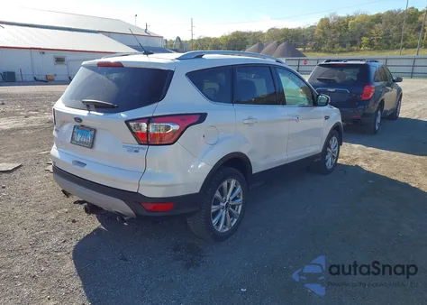 2017 Ford Escape Titanium z USA, uszkodzony, nr VIN 1FMCU9J91HUE31420
